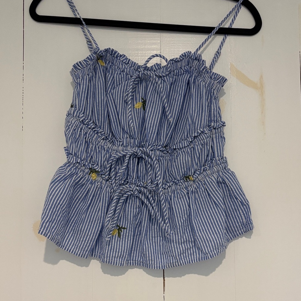Cotton blue and white striped spaghetti strap top with embroidered lemon detail